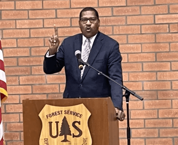 Dr. Homer Wilkes speaking at the U.S. Forest Service
